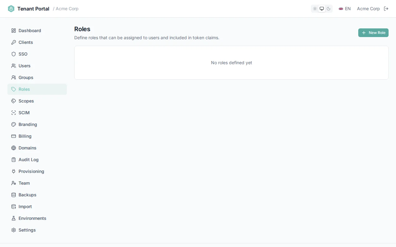 Roles table with inline editing active, showing editable name and description fields with save and cancel icons